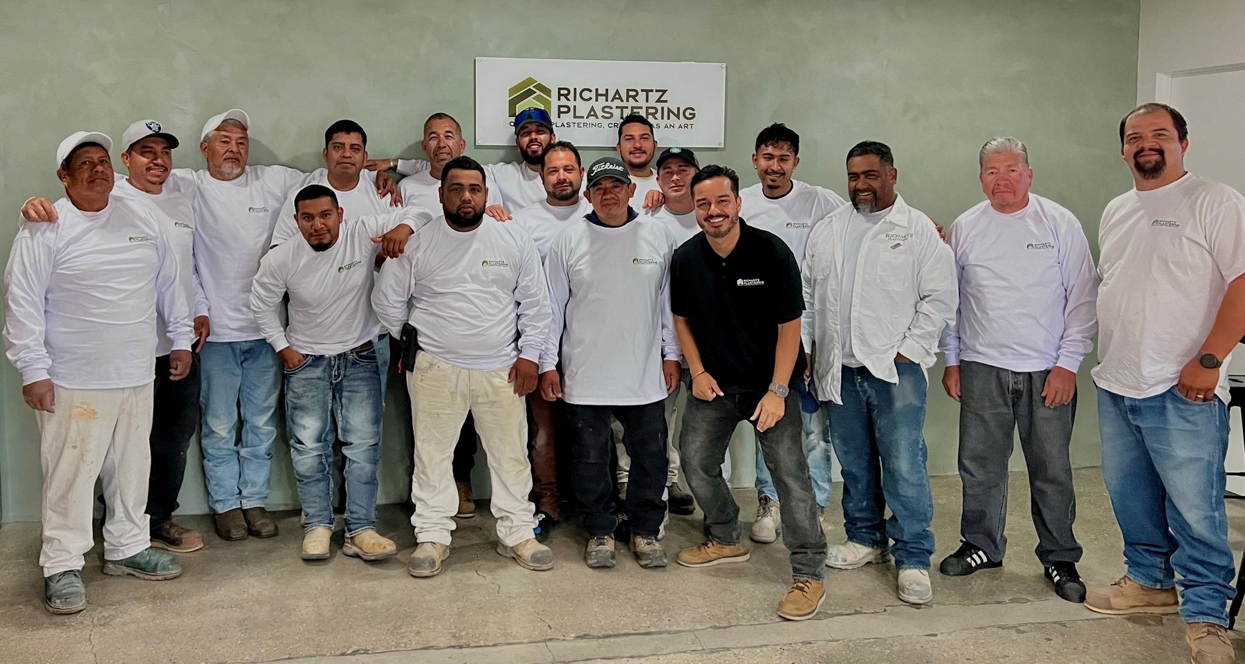 Richartz Plastering crew standing together